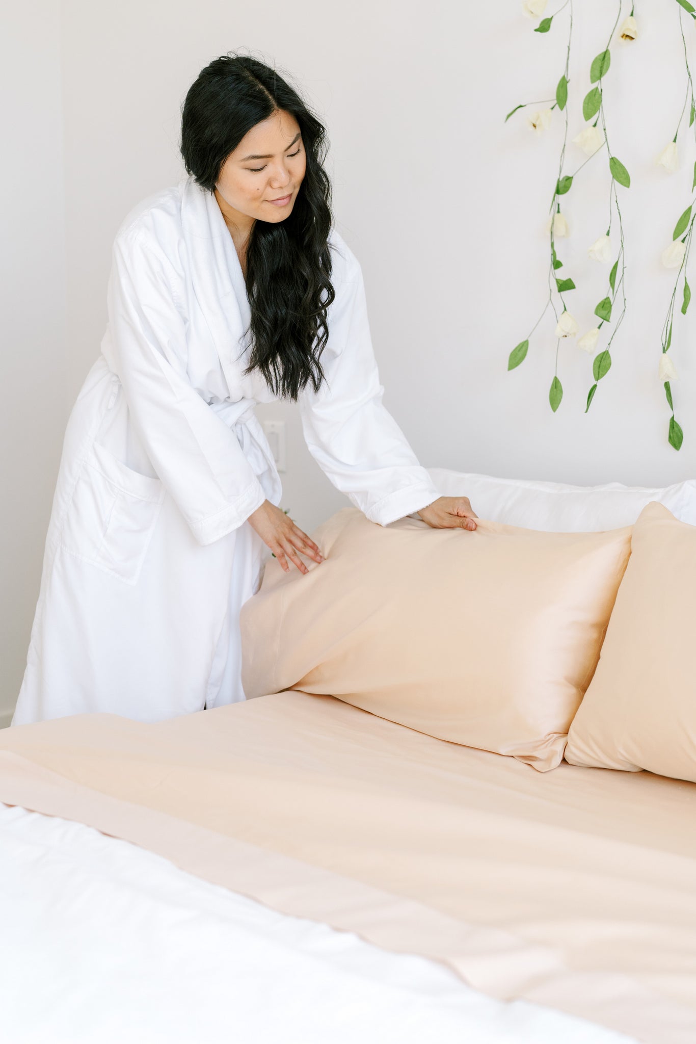 Luxurious bed linens in a small bedroom